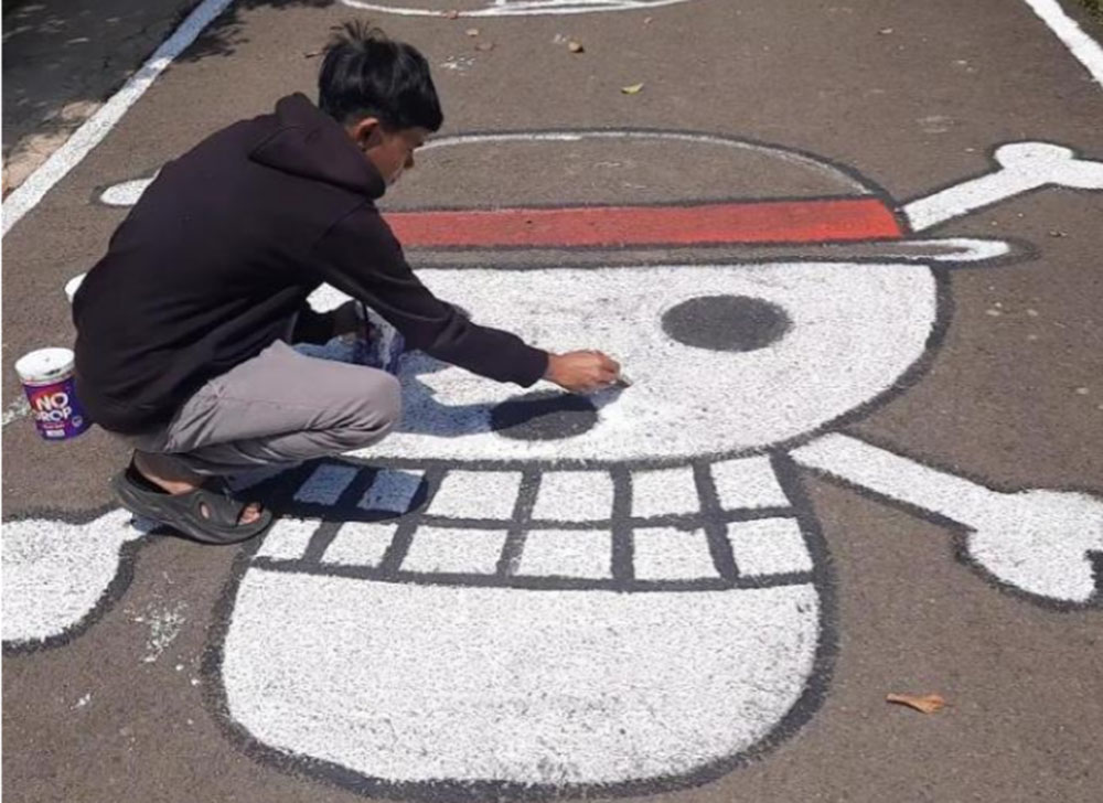Viral Bendera One Piece Jelang HUT RI, Warga Kampung di Semarang Lukis Logo Jolly Roger di Jalanan