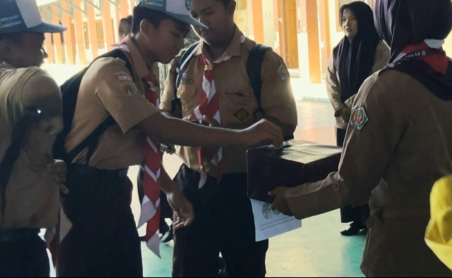 Tersentuh Kondisi Korban Bencana, Siswa SMK Satya Praja 2 Petarukan Turun Berdonasi