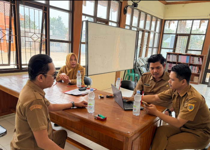 Tim JDIH Brebes Monitoring Pengisian Metadata Website JDIH Desa di Kecamatan Kersana
